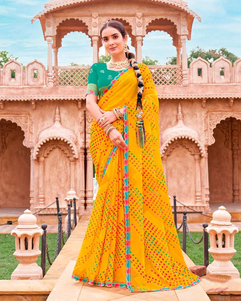Vishal Prints Yellow Orange Fancy Chiffon Traditional Print Saree With Foil Print And Cut Work Border