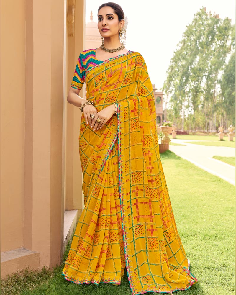 Vishal Prints Kesariya Peela Traditional Print Georgette Saree With Fancy Gota Patti Border