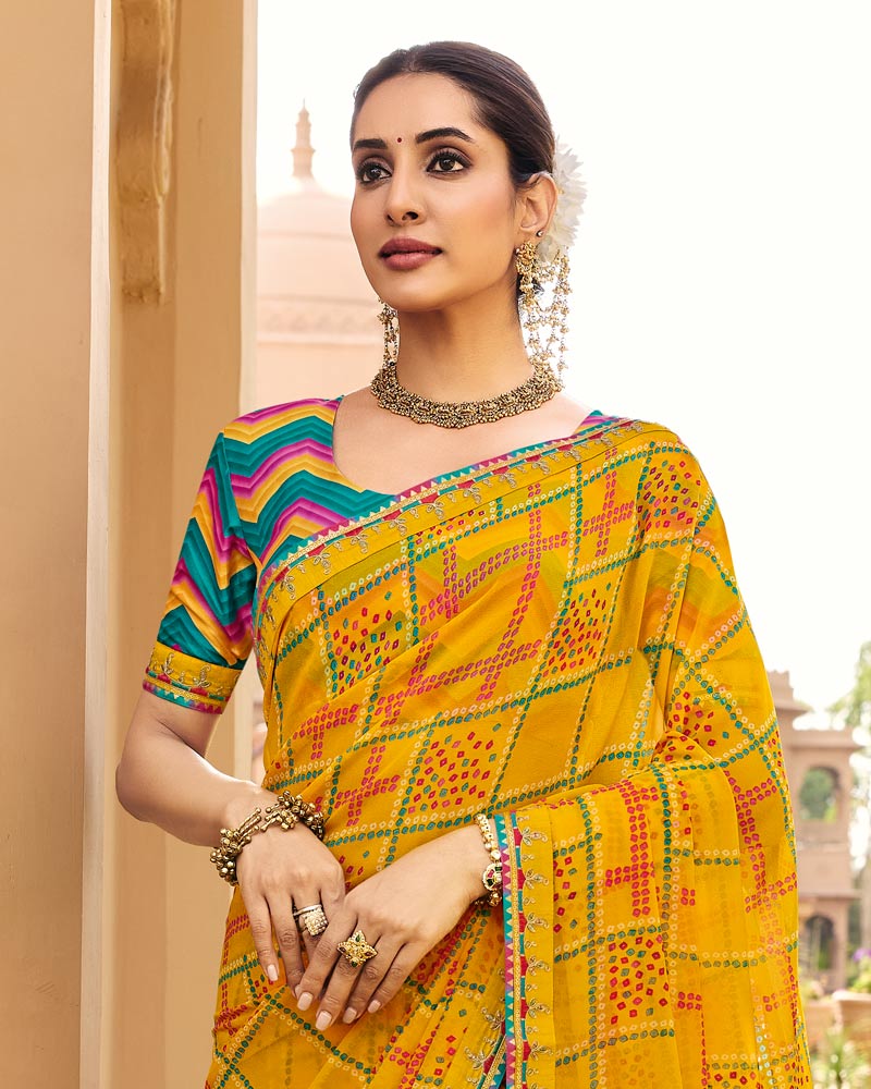 Vishal Prints Kesariya Peela Traditional Print Georgette Saree With Fancy Gota Patti Border