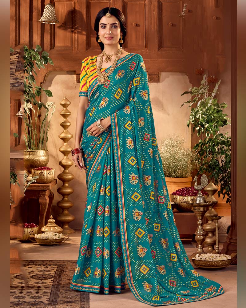Vishal Prints Peacock Blue Traditional Printed Fancy Chiffon Saree With Foil Print And Embroidery Border