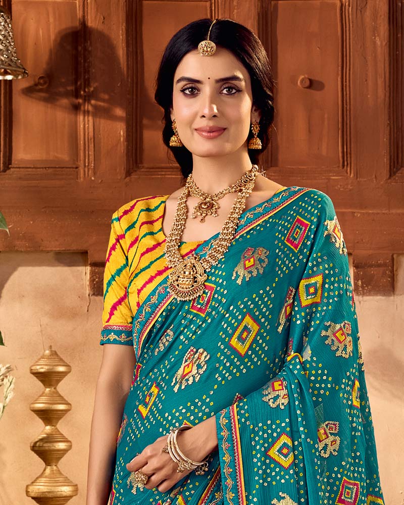 Vishal Prints Peacock Blue Traditional Printed Fancy Chiffon Saree With Foil Print And Embroidery Border