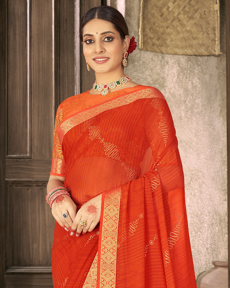 Vishal Prints Dark Orange Georgette Saree With Foil Print And Zari Border
