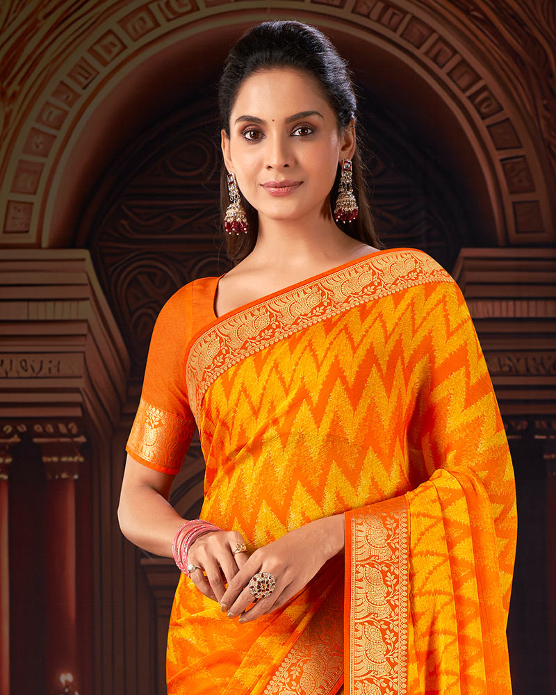Vishal Prints Orange Printed Moss Chiffon Saree With Fancy Border
