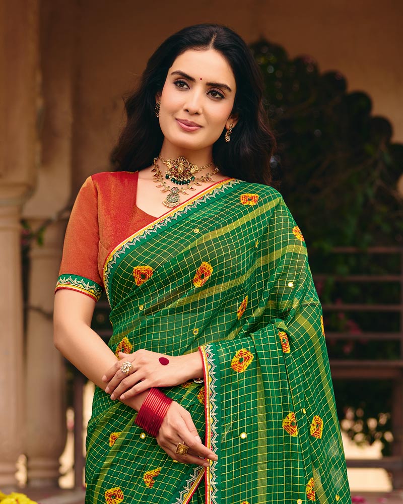 Vishal Prints Dark Green Traditional Print Chiffon Saree With Mirror Work And Fancy Embroidered Border