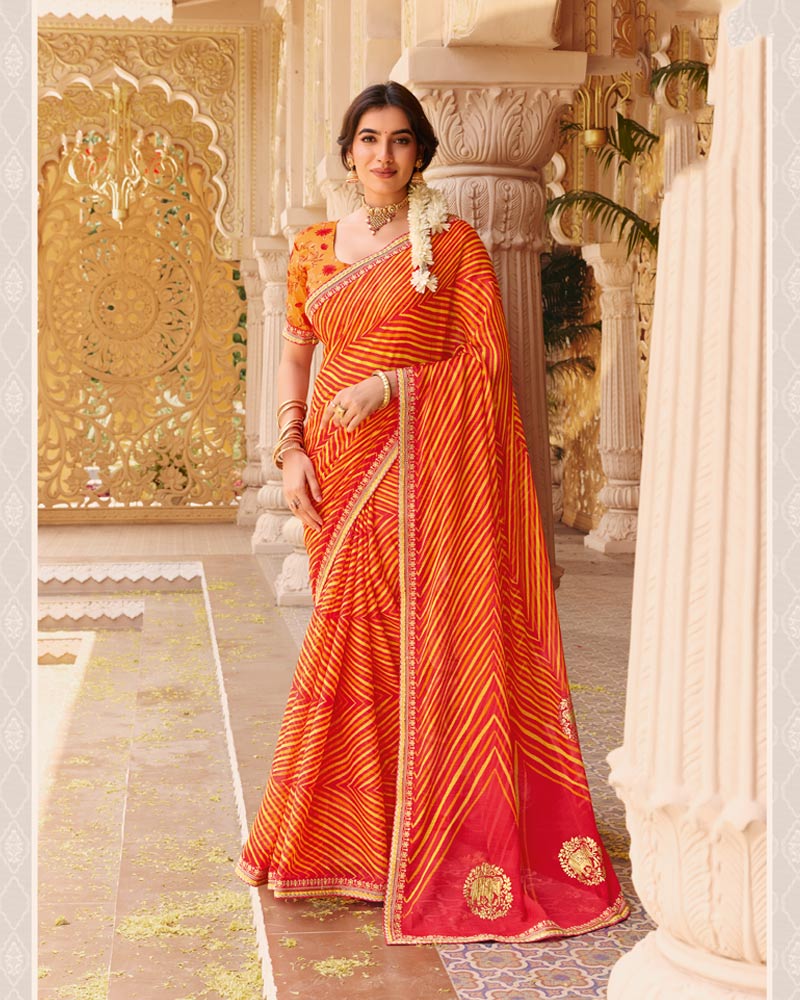 Vishal Prints Orange Fancy Chiffon Traditional Print Saree With Foil Print And Fancy Border