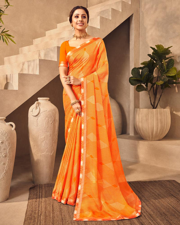Vishal Prints Orange Printed Chiffon Saree With Fancy Border