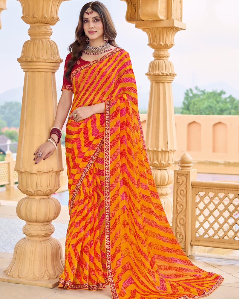 Vishal Prints Pumpkin Orange Printed Chiffon-Brasso Saree With Fancy Border