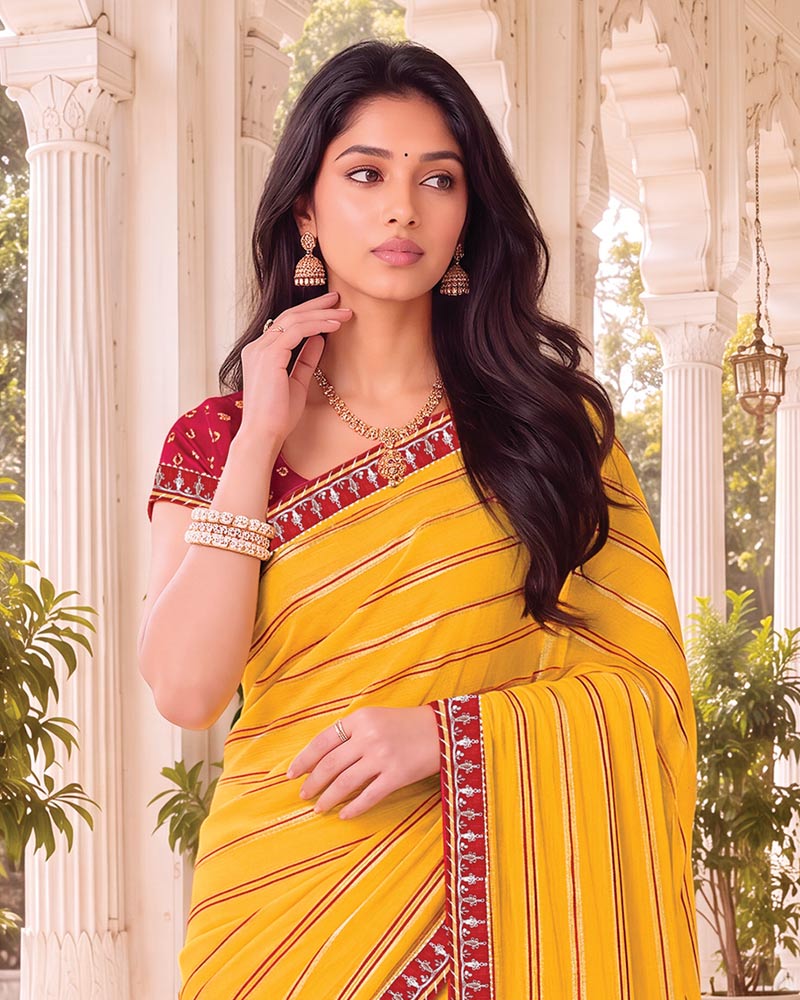 Vishal Prints Bright Yellow Georgette Saree With Foil Print And Fancy Embroidery Border With Tassel