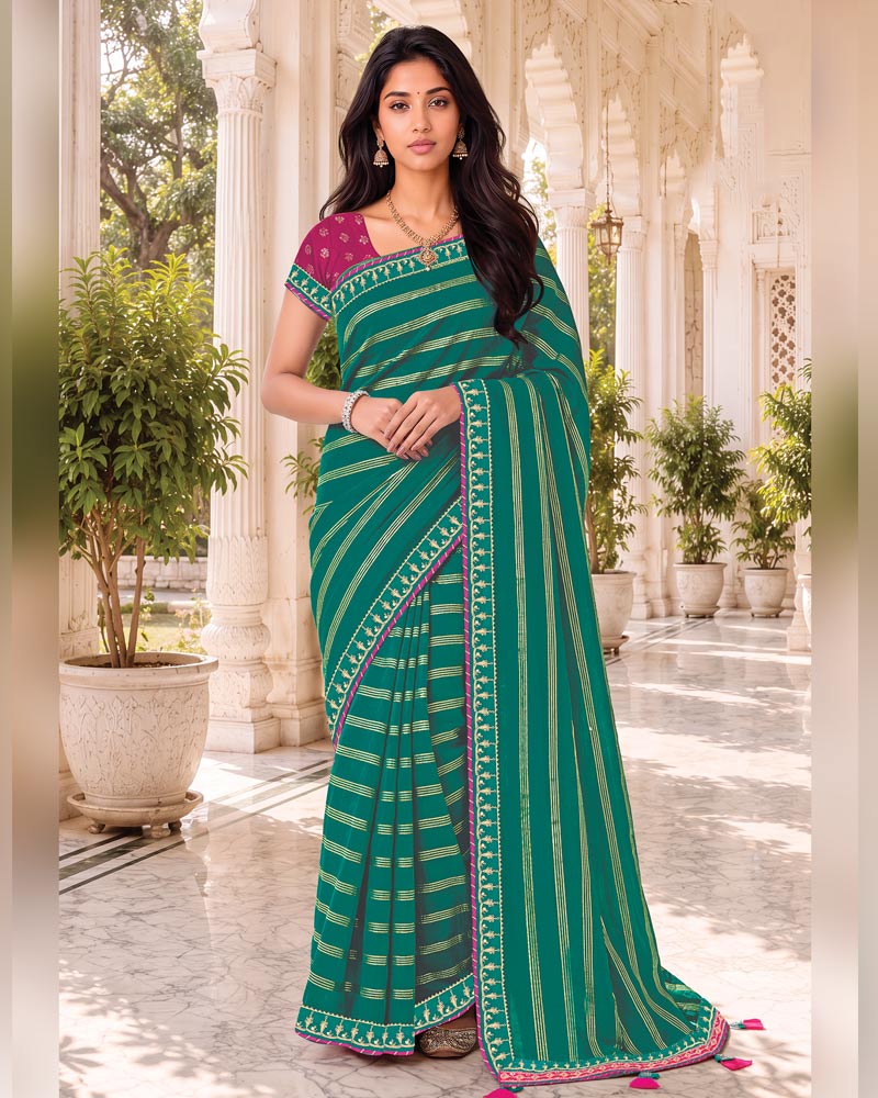 Vishal Prints Teal Green Georgette Saree With Foil Print And Fancy Embroidery Border With Tassel