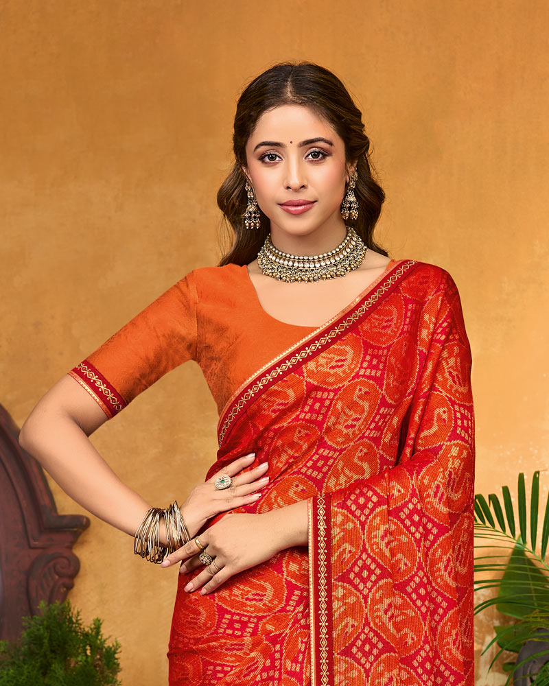 Vishal Prints Red And Orange Printed Brasso Traditional Print Saree With Fancy Border