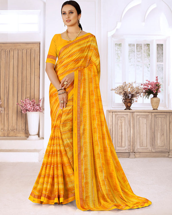Vishal Prints Saffron Color Printed Chiffon Saree With Foil Print And Fancy Border