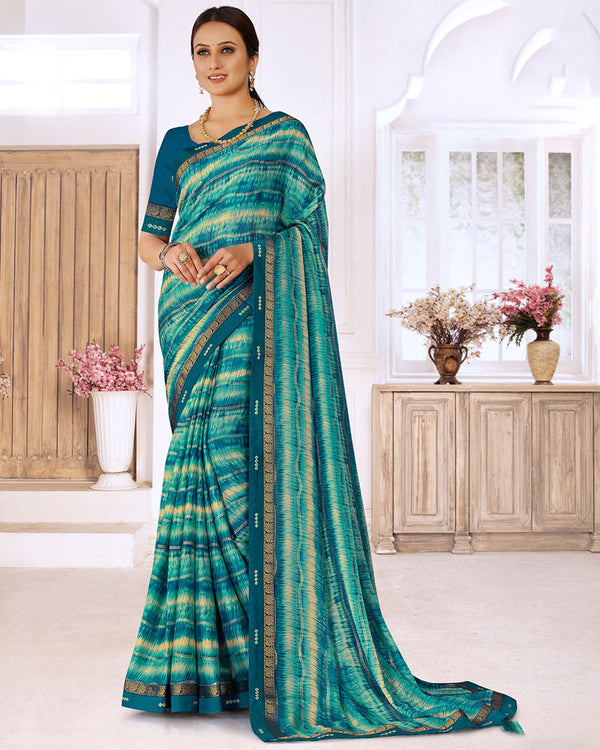 Vishal Prints Teal Blue Printed Chiffon Saree With Foil Print And Fancy Border