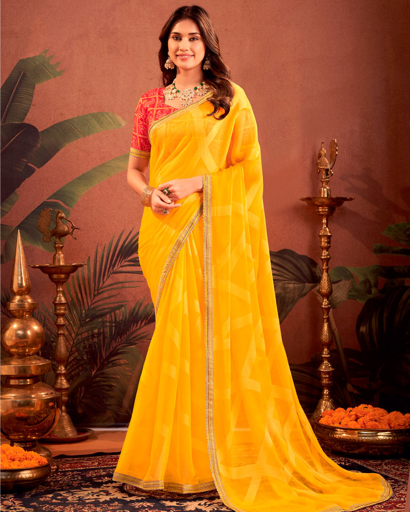 Vishal Prints Golden Yellow Designer Chiffon-Brasso Traditional Print Saree With Fancy Embroidery Border