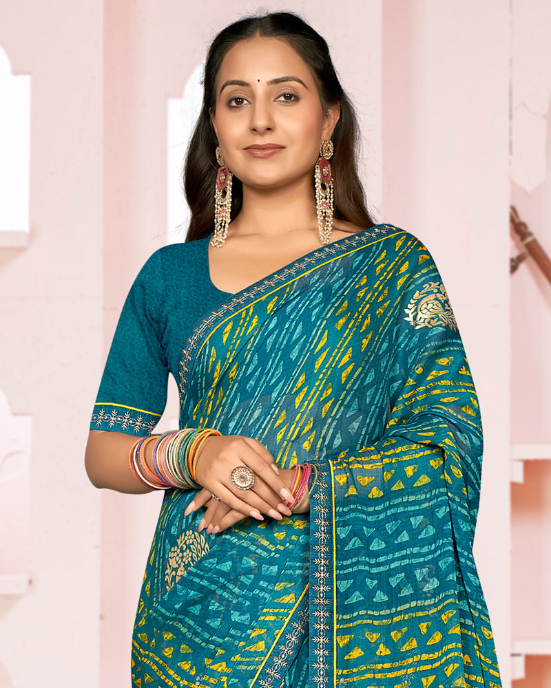 Vishal Prints Dark Aqua Blue Printed Chiffon Saree With Foil Print And Fancy Embroidery Border
