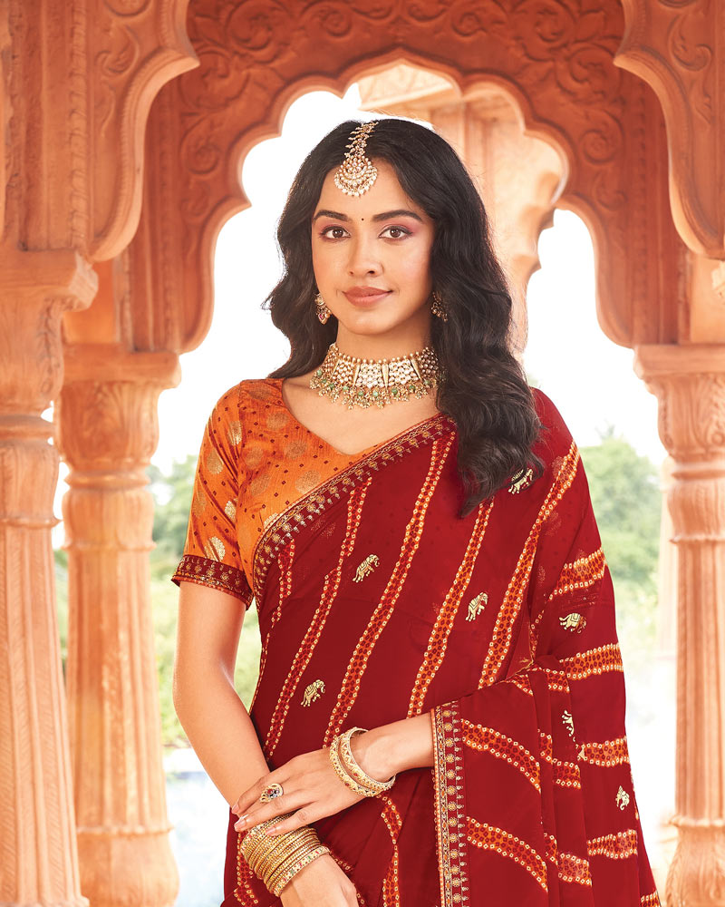 Vishal Prints Brick Red Printed Georgette Traditional Print Saree With Foil Print And Fancy Border
