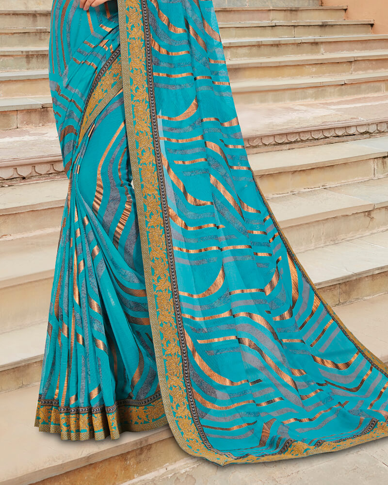 Vishal Prints Teal Blue Brasso Saree With Foil Print And Jari Border