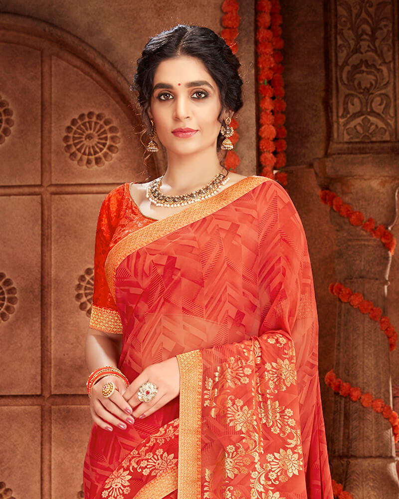 Vishal Prints Orange Georgette Saree With Foil Print And Jari Border