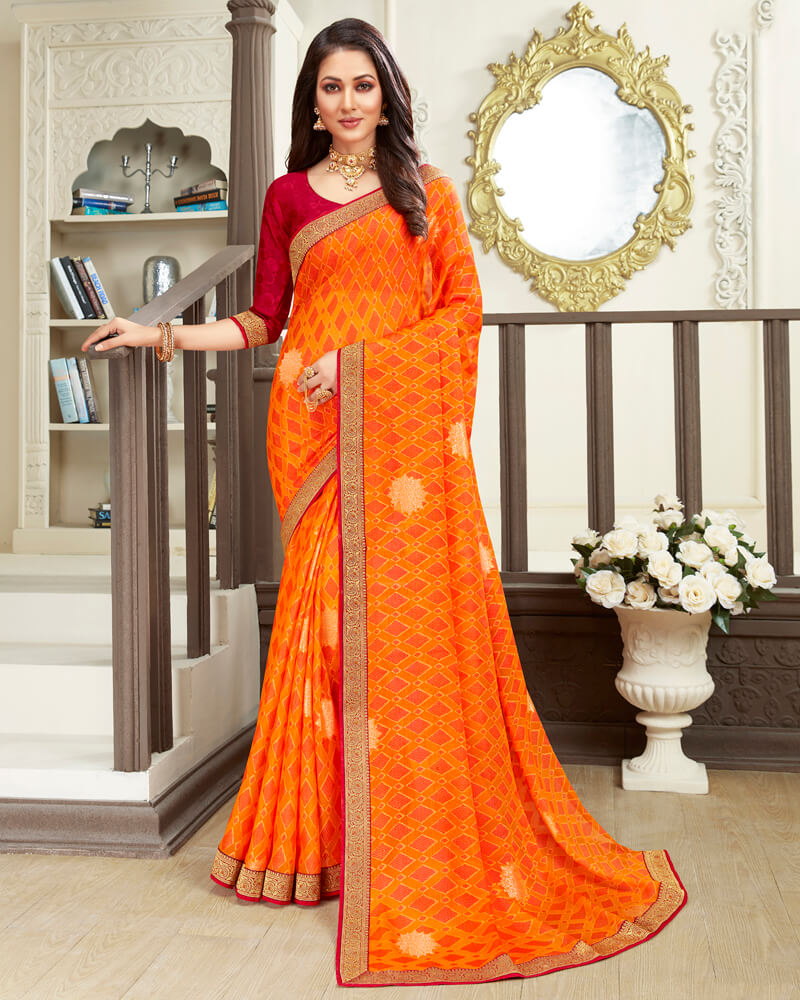 Vishal Prints Orange Brasso Saree With Foil Print And Jari Border