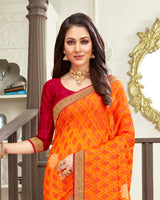 Vishal Prints Orange Brasso Saree With Foil Print And Jari Border