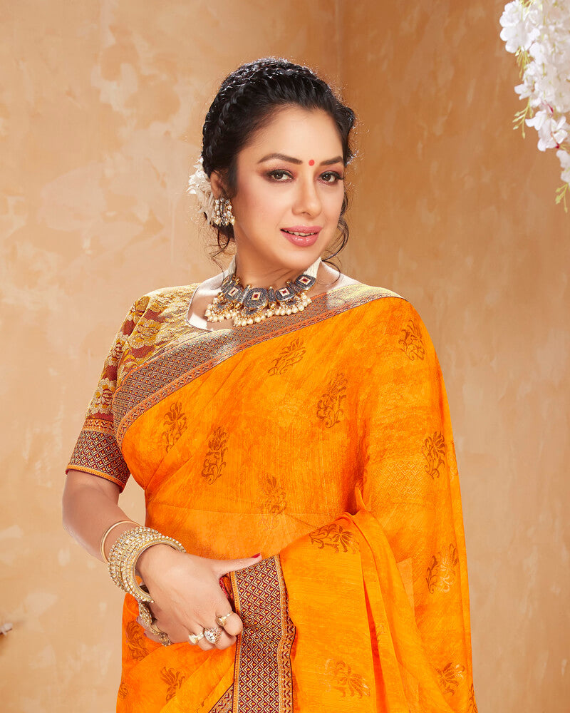 Vishal Prints Orange Chiffon Saree With Foil Print And Border
