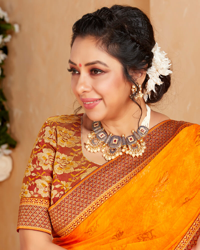 Vishal Prints Orange Chiffon Saree With Foil Print And Border