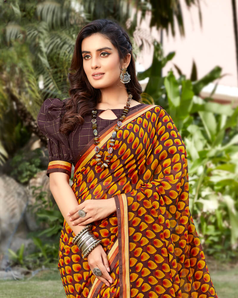 Vishal Prints Orange And Brown Georgette Saree With Satin Border