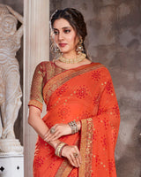 Vishal Prints Orange Georgette Saree With Foil Print And Jari Border