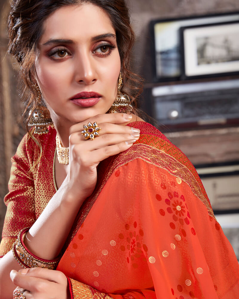 Vishal Prints Orange Georgette Saree With Foil Print And Jari Border