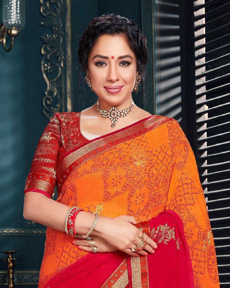 Vishal Prints Orange Chiffon Saree With Foil Print And Jari Border
