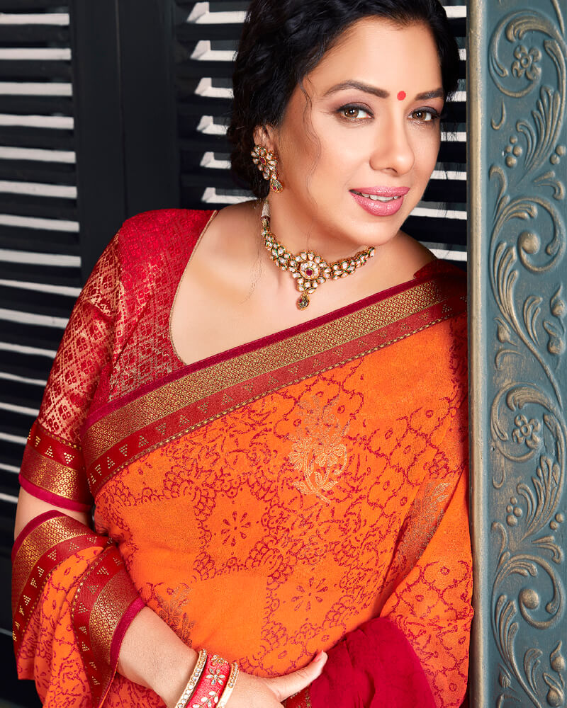 Vishal Prints Orange Chiffon Saree With Foil Print And Jari Border