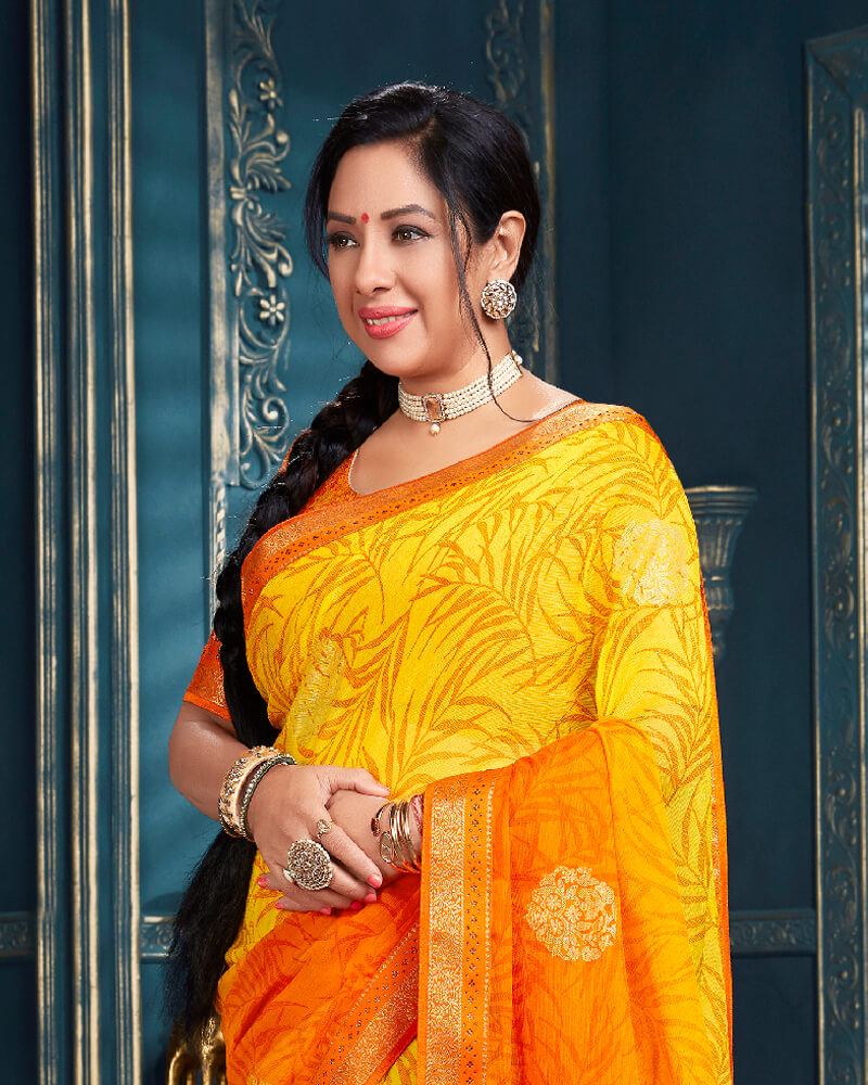 Vishal Prints Orange Chiffon Saree With Foil Print And Jari Border