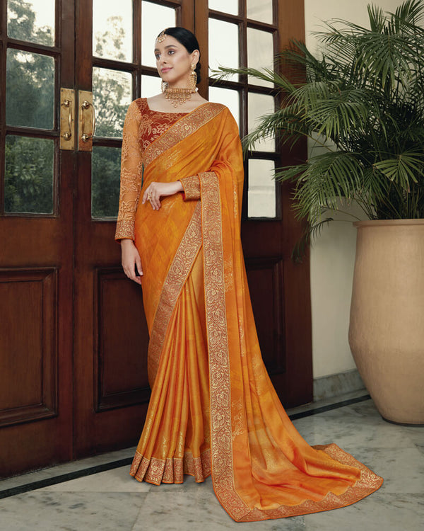 Vishal Prints Yellowish Orange Chiffon Saree With Foil Print And Jari Border