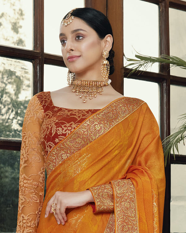 Vishal Prints Yellowish Orange Chiffon Saree With Foil Print And Jari Border