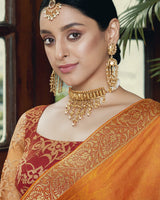 Vishal Prints Yellowish Orange Chiffon Saree With Foil Print And Jari Border