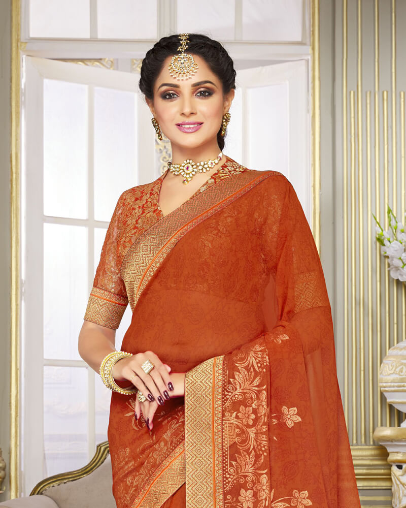 Vishal Prints Dark Orange Chiffon Saree With Foil Print And Jari Border