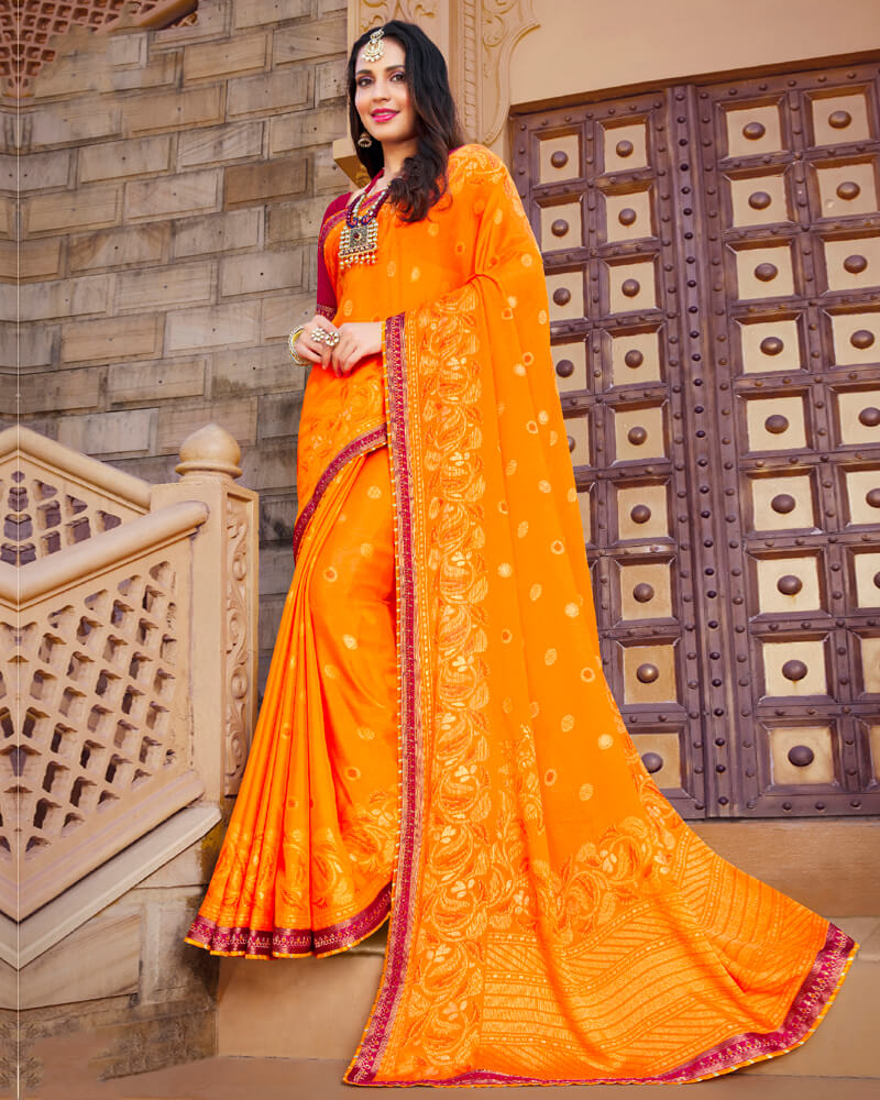 Vishal Prints Orange Brasso Saree With Foil Print And Border