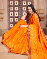Vishal Prints Orange Brasso Saree With Foil Print And Border