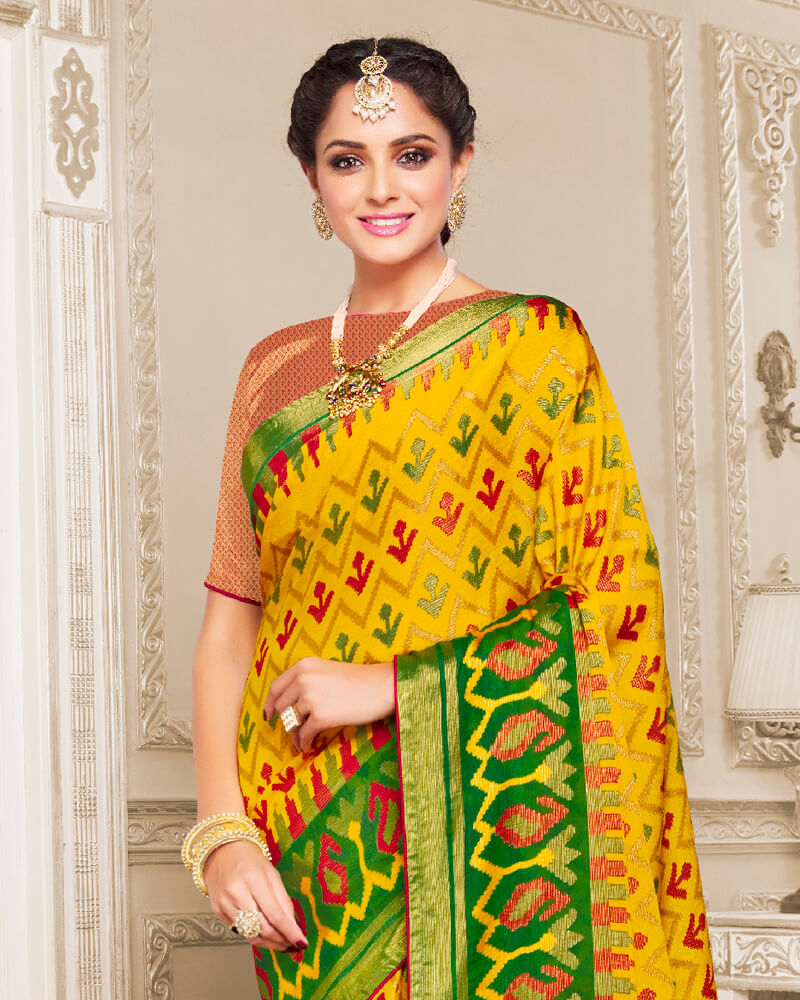 Vishal Prints Golden Yellow Brasso Saree With Foil Print And Tassel