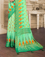Vishal Prints Sea Green Brasso Saree With Foil Print And Tassel