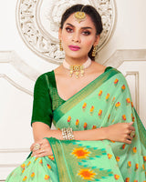 Vishal Prints Sea Green Brasso Saree With Foil Print And Tassel