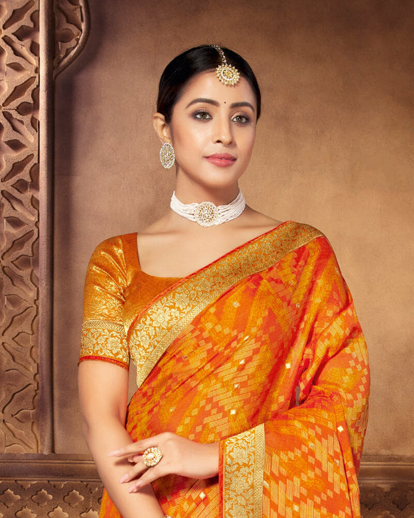 Vishal Prints Yellowish Orange Brasso Saree With Foil Print And Jari Border