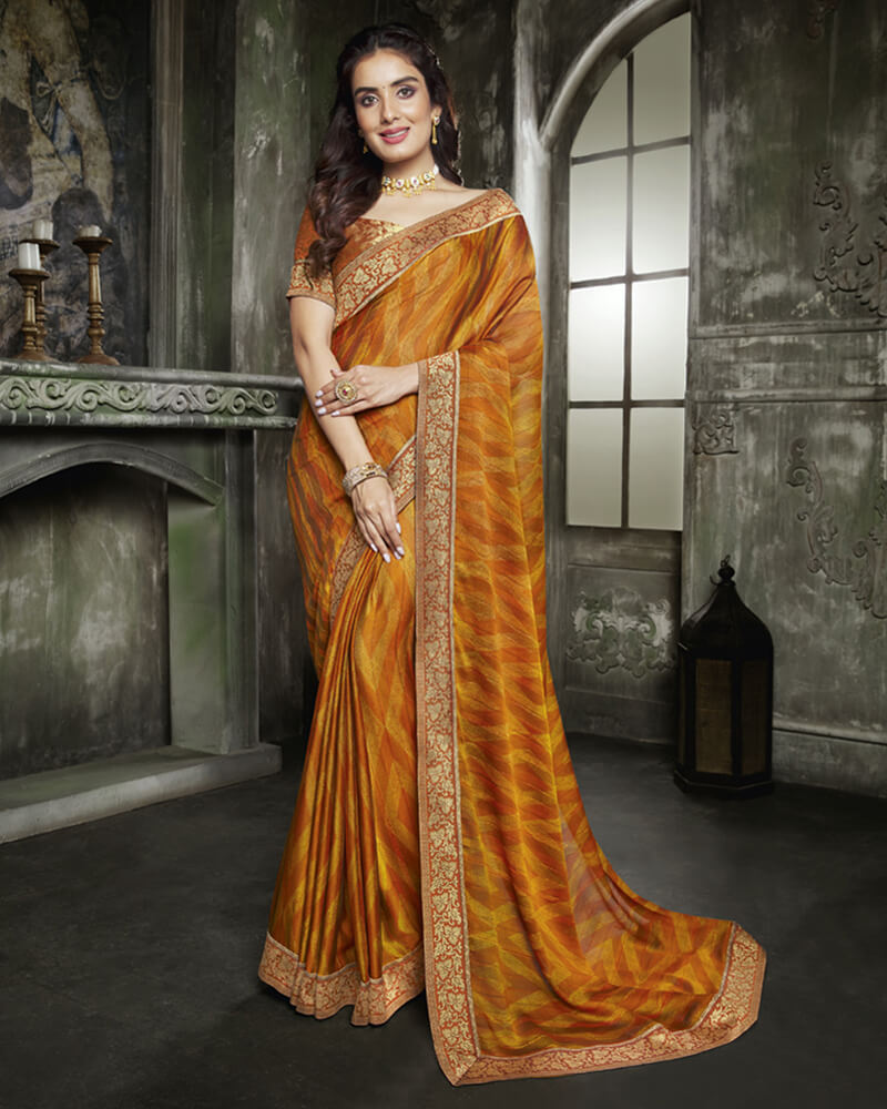 Vishal Prints Orange And Mustard Chiffon Saree With Jari Border