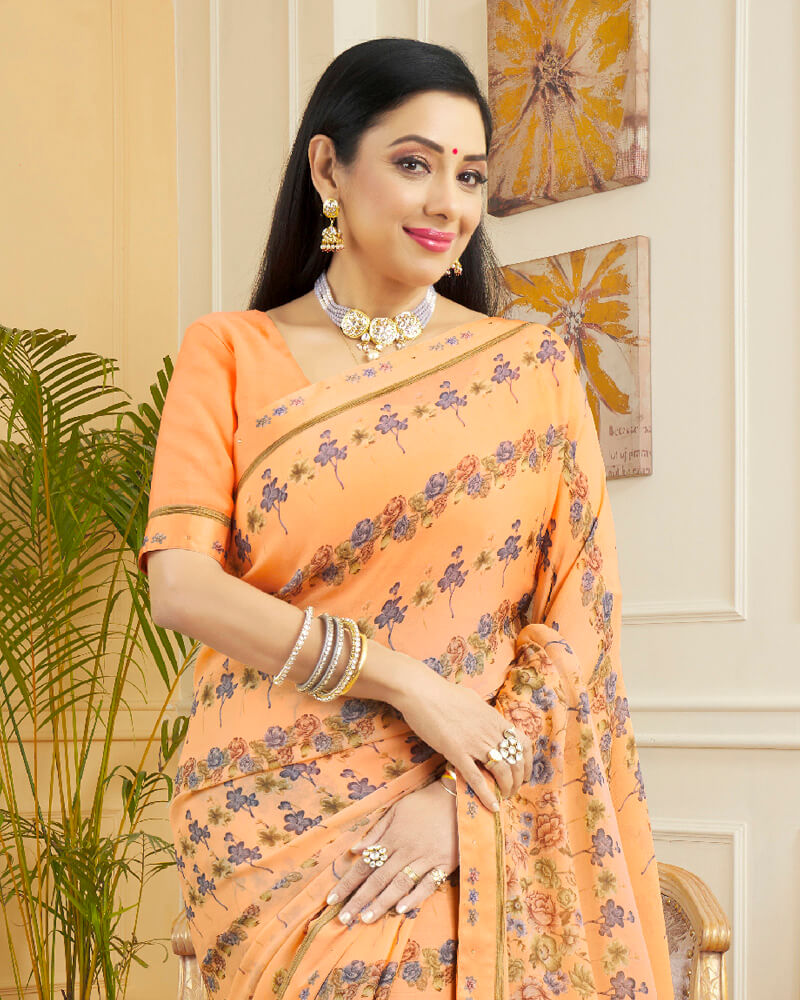 Vishal Prints Pastel Orange Printed Chiffon Saree With Border