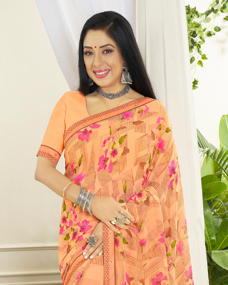 Vishal Prints Pastel Orange Printed Georgette Saree With Border