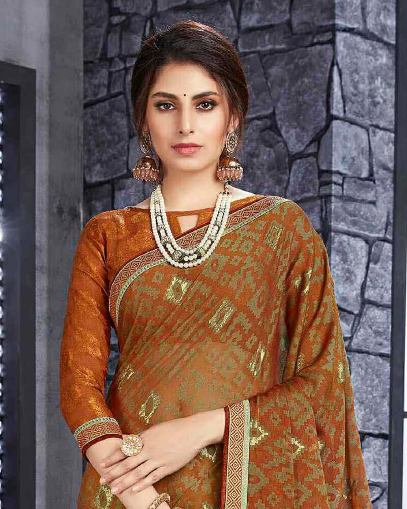 Vishal Prints Ochre Brasso Saree With Foil Print And Zari Border