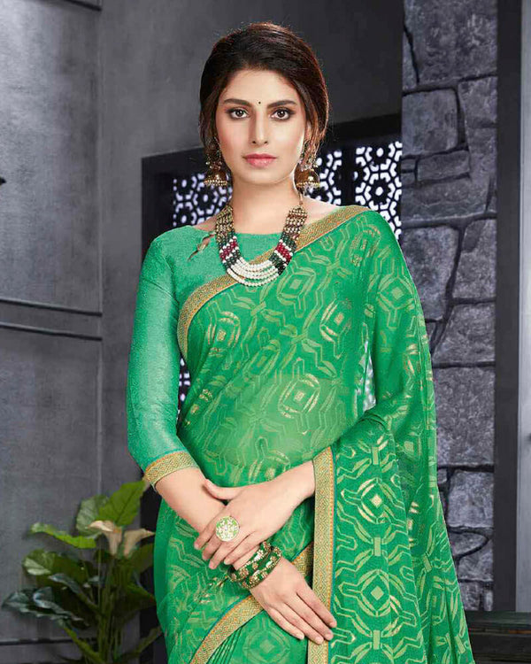 Vishal Prints Jade Green Brasso Saree With Foil Print And Zari Border
