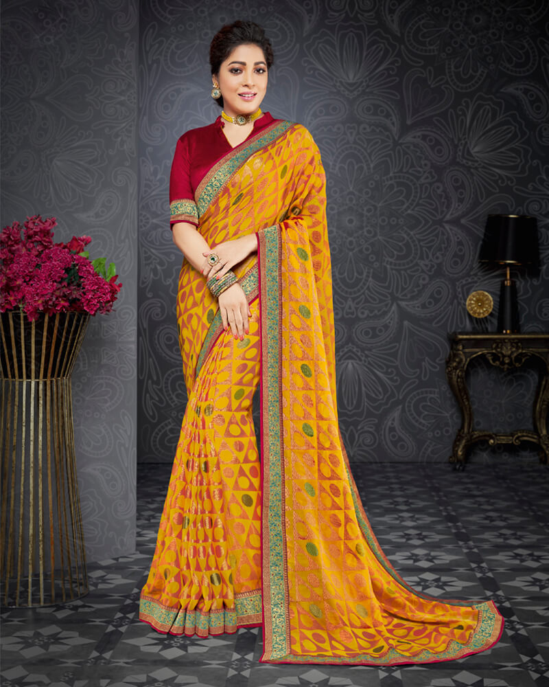 Vishal Prints Dark Yellow Brasso Saree With Jari Border And Foil Print