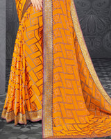 Vishal Prints Saffron Color Brasso Saree With Jari Border And Foil Print