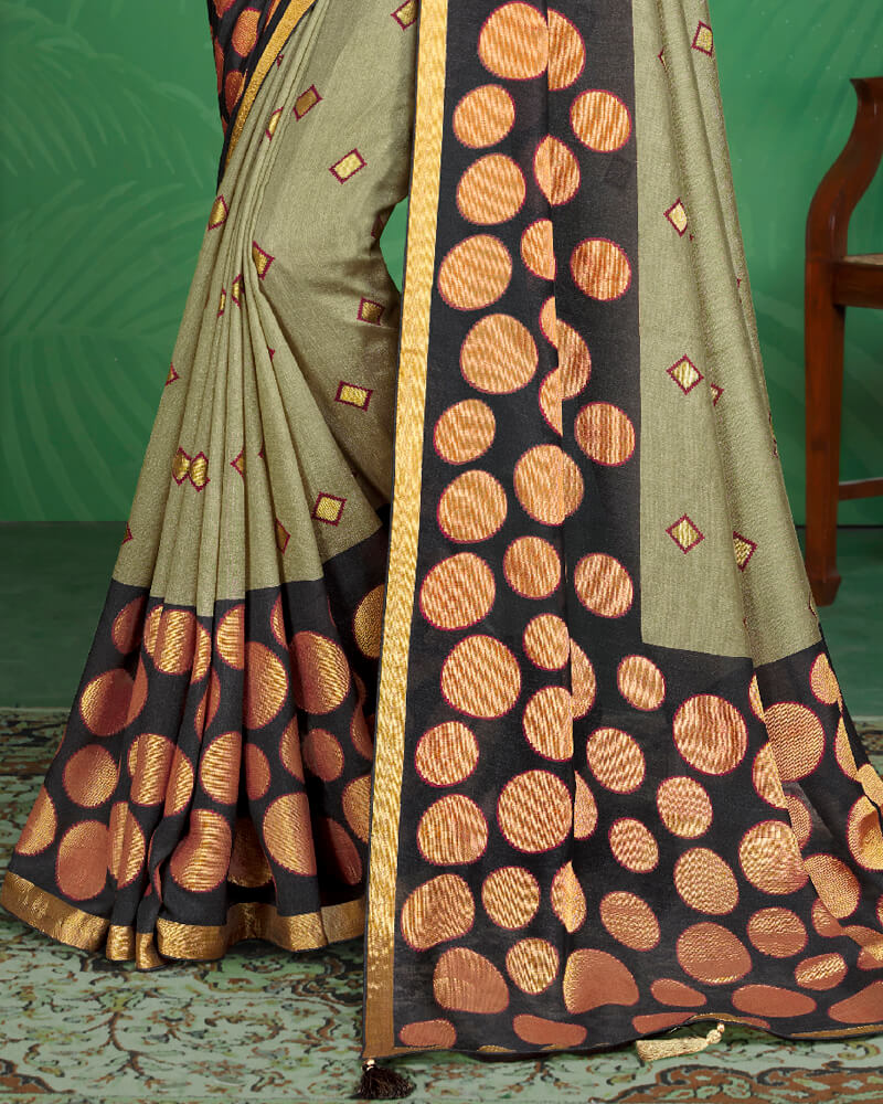 Vishal Prints Pastel Olive And Black Brasso Saree With Foil Print And Jari Border