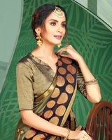 Vishal Prints Pastel Olive And Black Brasso Saree With Foil Print And Jari Border